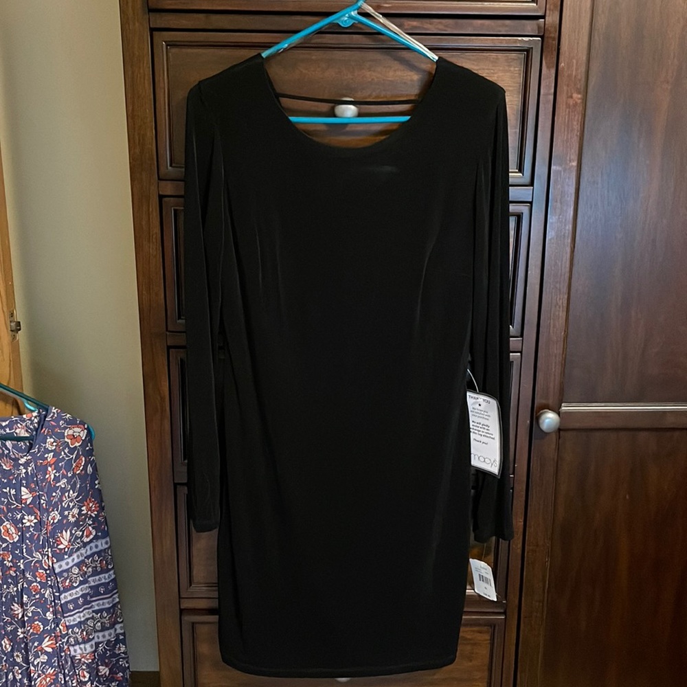 Form fitting black cocktail dress